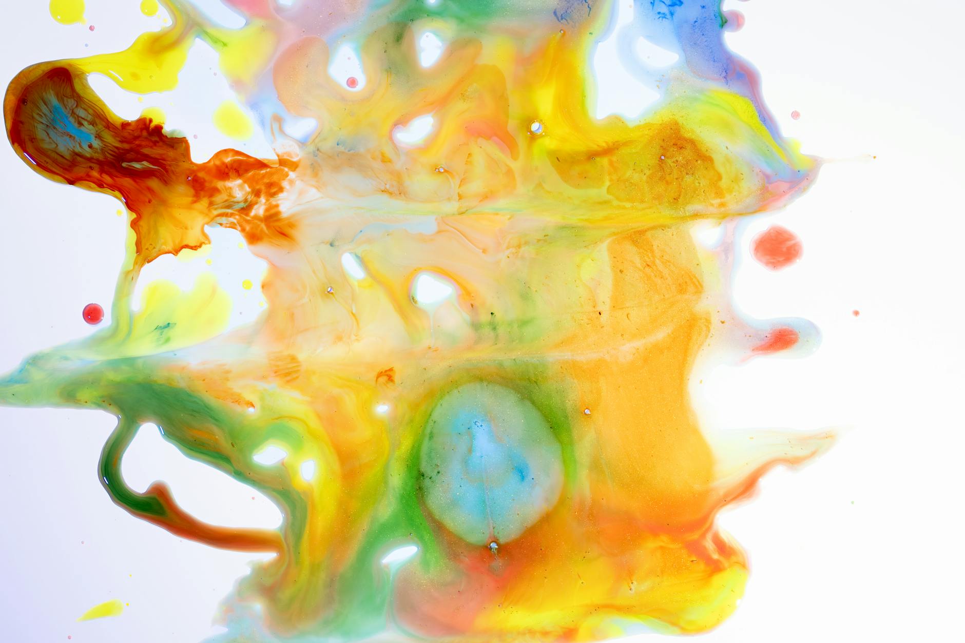 Dynamic and colorful abstract fluid art with vibrant paint splashes and textures.
